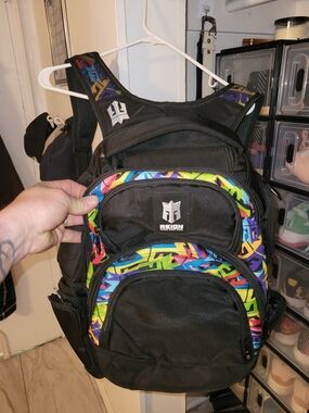 Reign Black Backpack with Neon Multicolor Graffiti Trim